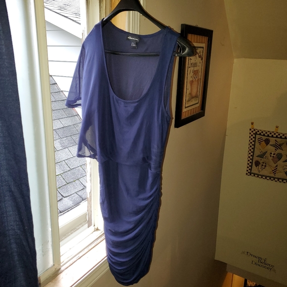 Navy blue dress with fancy, flowing arm detail. - Picture 1 of 3